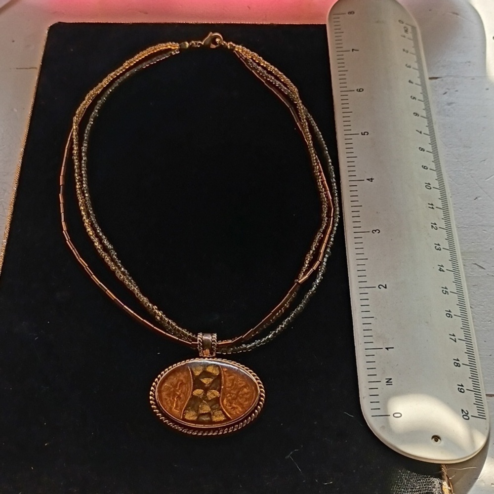 Elegant Gold Tone and Brown Pendant Necklace (Kenneth Cole)